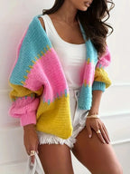 Candy Cloud Cardigan ¨C oversized color block knit in fuchsia, pink, yellow, and blue.