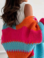 Candy Cloud Cardigan ¨C oversized color block knit in orange, pink, blue, and contrasting tones.